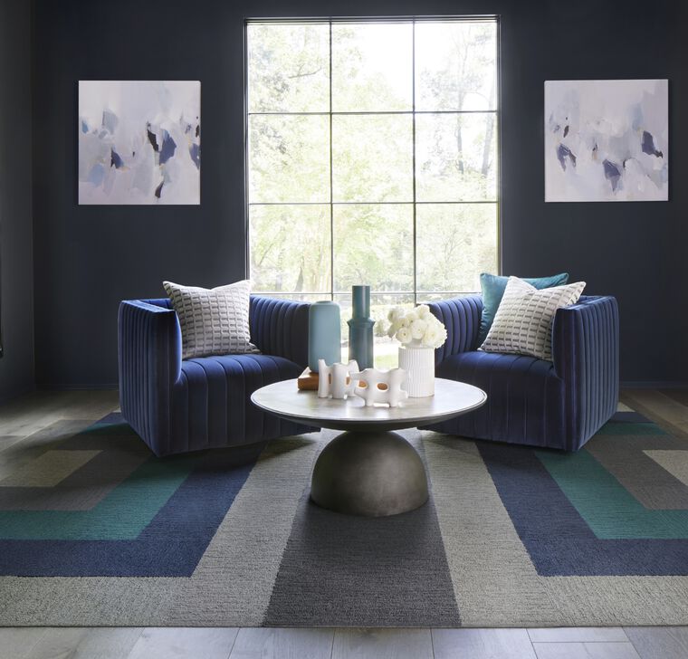 Seating area featuring FLOR A Muse Me area rug shown in Indigo.